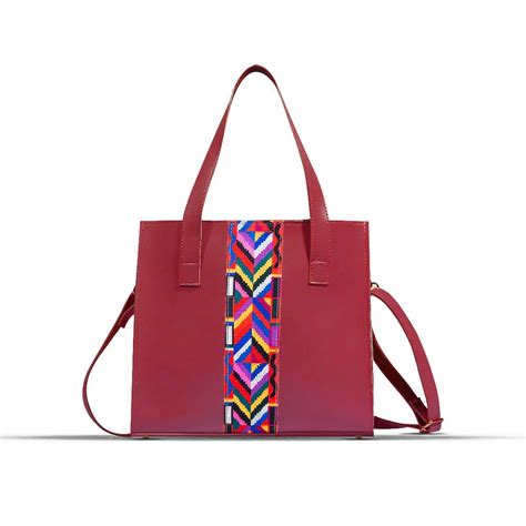 Sway Maroon Handbag .